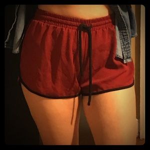 Dark red shorts with black string & detail